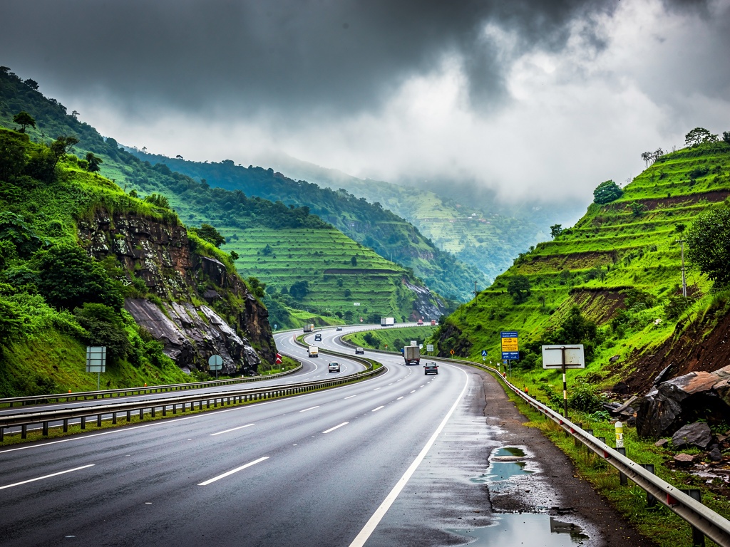 The Mumbai-Pune Expressway cutting through the green Sahyadri hills near Lonavla